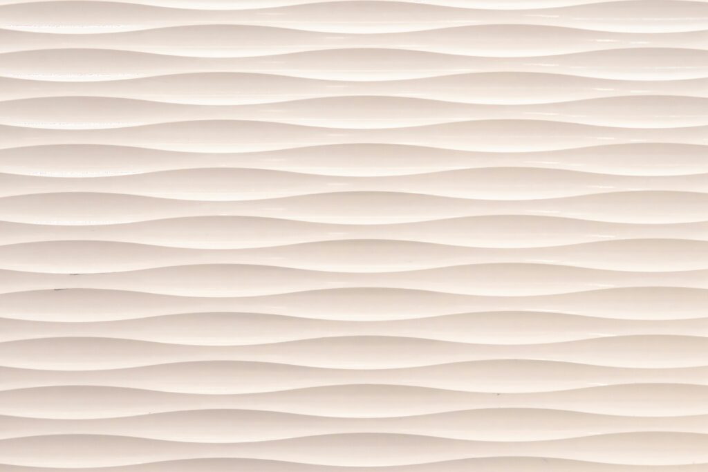Seamless white wavy 3D texture, perfect for abstract and minimalist backgrounds.
